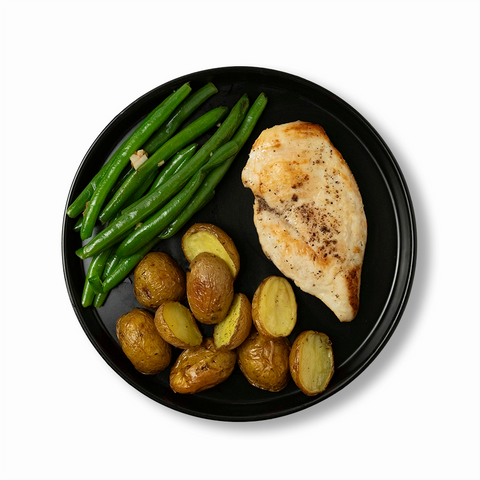 Seared Chicken Breast With Roasted Potatoes and Garlic Green Beans